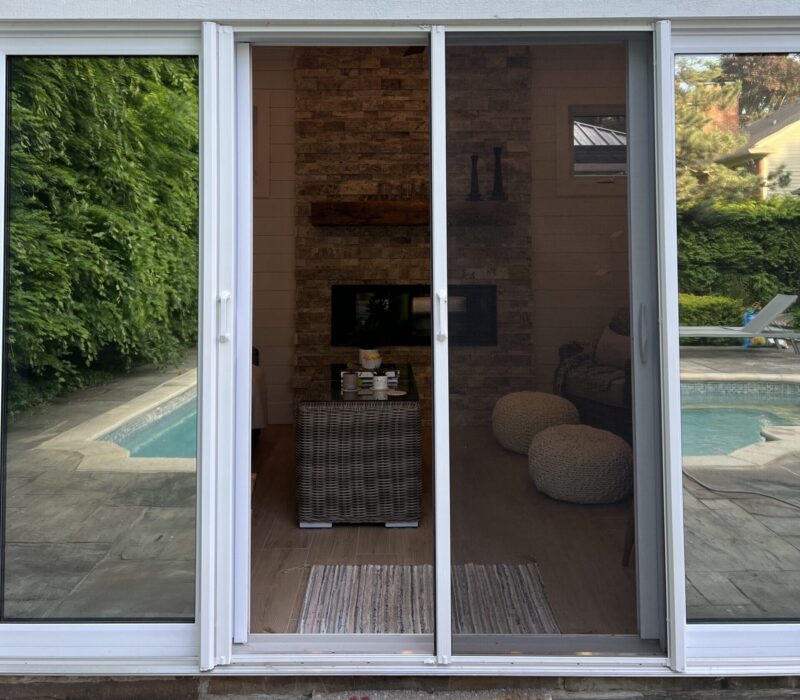 The picture shows Phantom double door screens installed on the glass sliding door.